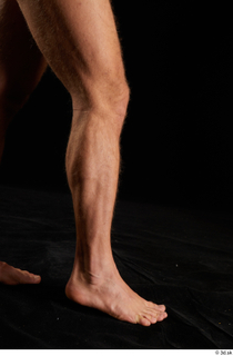 Herbert 1 10years calf flexing nude side view 0005.jpg